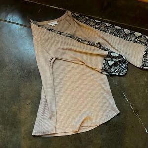 soft blush small with snake print sleeves and cuffed ballon sleeves!
